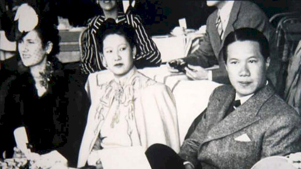 Image capturing the presence of King Bao Dai and Queen Nam Phuong at an event